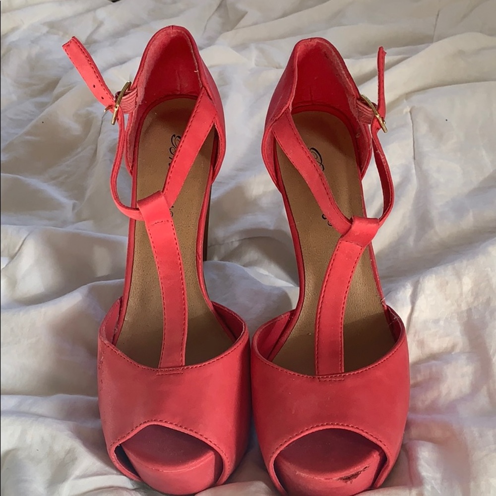Pink high heels shoes with strap and platform